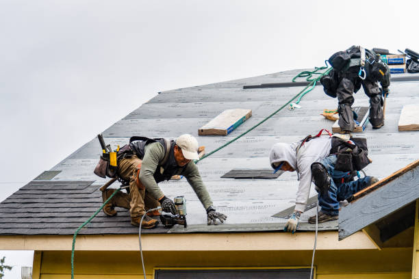 Professional Roof Replacement technician working in Charlestown, RI